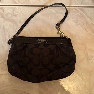 Used Coach navy blue wristlet